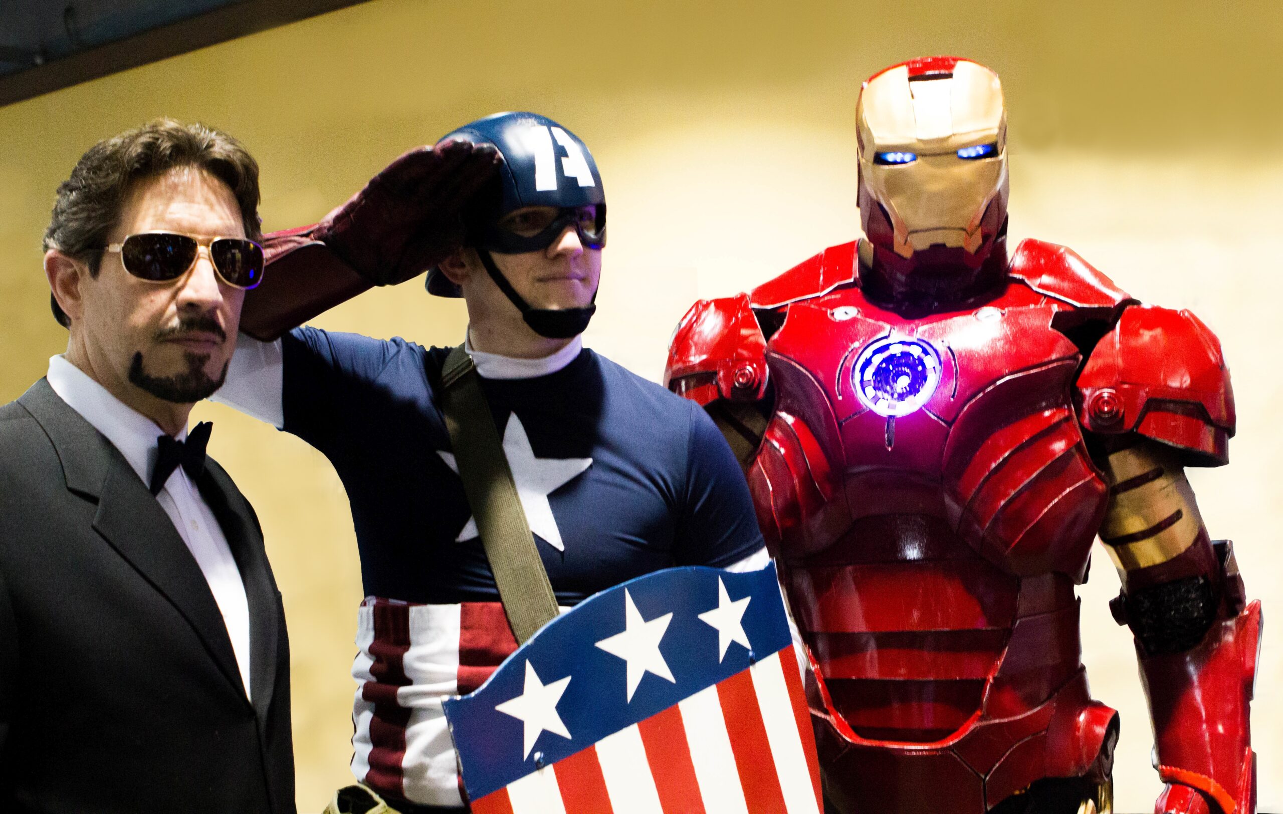 Cosplay of Tony Stark, Captain America and Iron Man at LBCC 2013 (edited homogeneous background).jpg