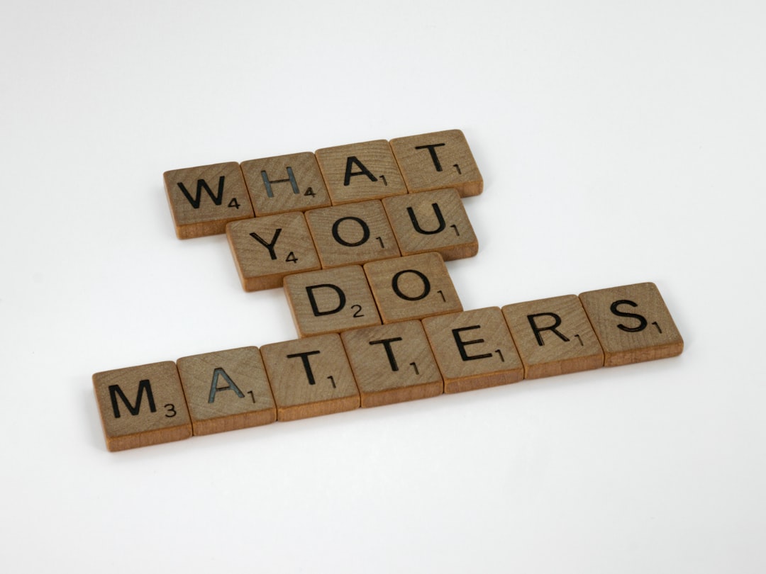 scrabble, scrabble pieces, lettering, letters, wood, scrabble tiles, white background, words, quote, letters, type, typography, design, layout, focus, bokeh, blur, photography, images, image, what you do matters, relevance, people power, God loves you, people matter, everyone matters, what you do counts, don't despair, keep going, you are loved, perseverance,